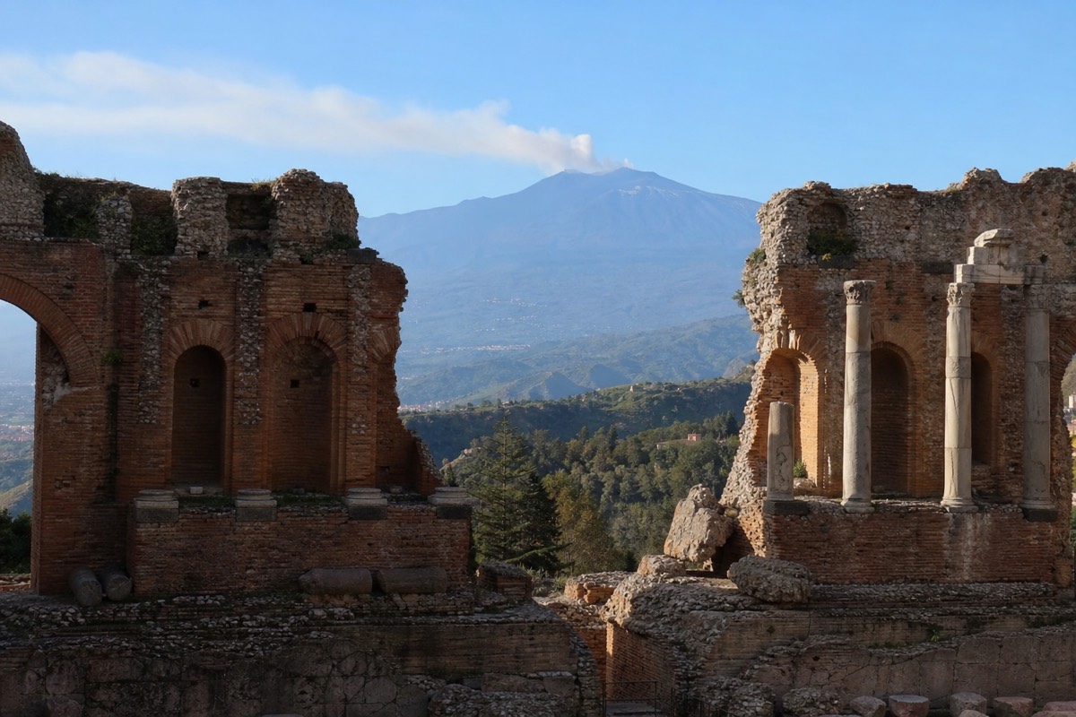 View of Mount Etna's summit from Taormina's ancient Greek theatre
